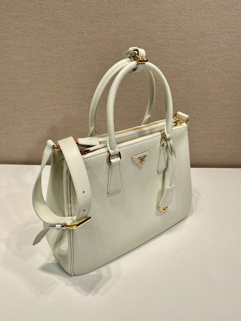 Pra*a top handle bags